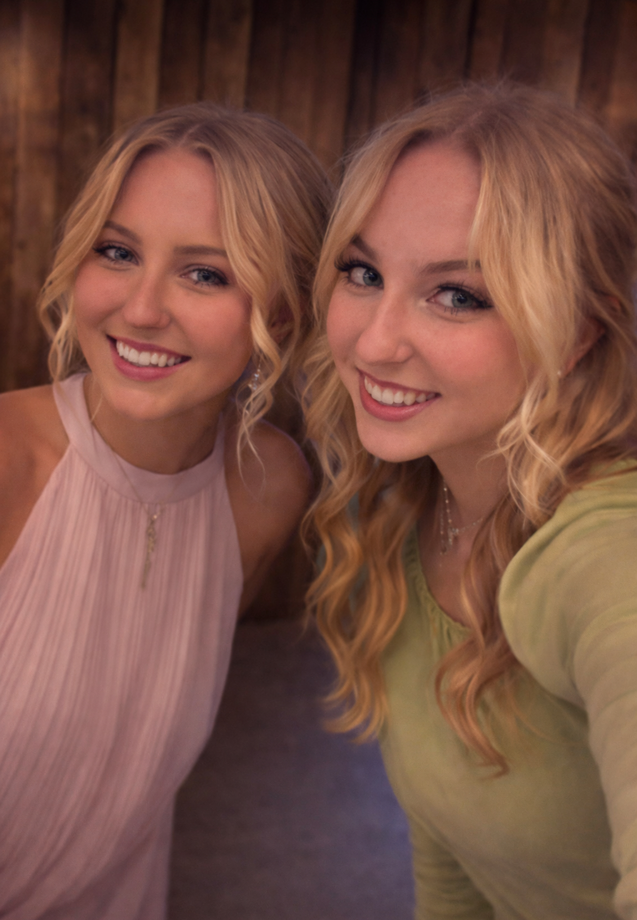 Dr. Melissa Shelton&rsquo;s twin daughters smiling together during a family photo